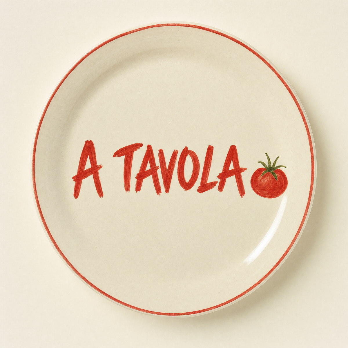 Ivory ceramic dinner plate hand-lettered A Tavola in tomato red with a painted tomato