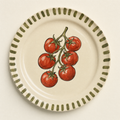Ivory ceramic dinner plate hand-painted with a truss of vine tomatoes and an olive brush-stroke rim